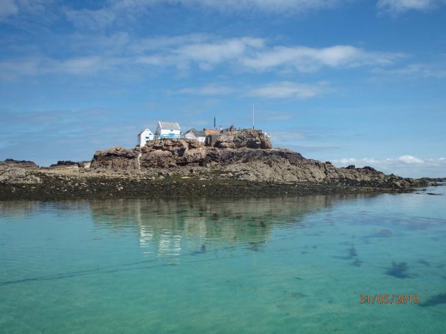 View of La Marmotière, one of four rocky heads within Les Écrehous & Les Dirouilles Ramsar Site that are large enough to support buildings