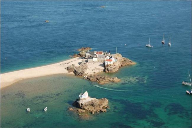 Aerial view of La Marmotière, one of four rocky heads within Les Écrehous & Les Dirouilles Ramsar Site that are large enough to support buildings
