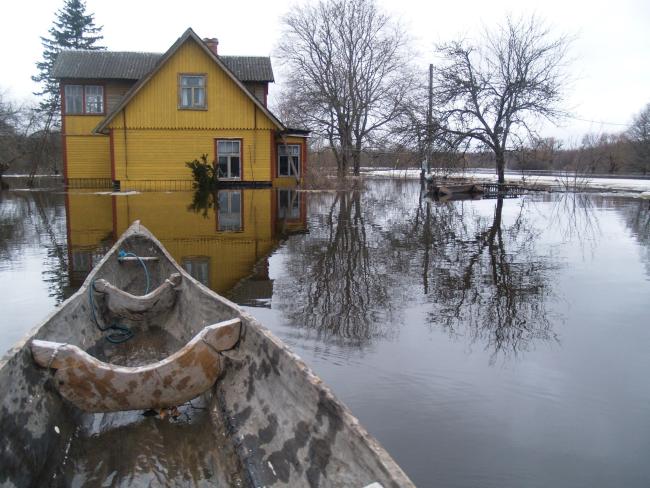 Dugout canoe is a practical vessel during flood "fifth" season.