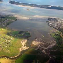 Aerial view of the Pitt Water-Orielton Lagoon Ramsar Site. Photo by Jim Mollison. Date unknown.